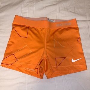 Orange patterned Nike pro spandex
